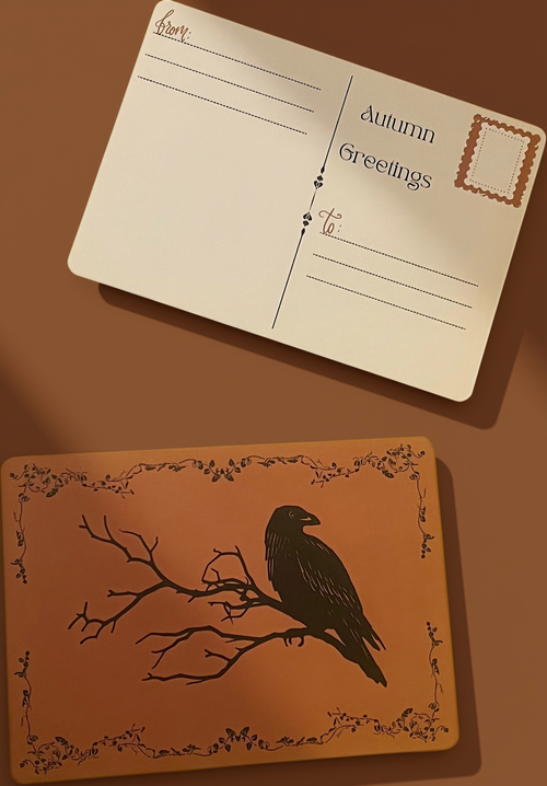 Autumn Greetings postcard on a warm brown background with a raven card