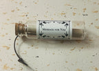 Message in a Bottle: a glass bottle containing a handwritten note, wrapped with a printed Message for You label.
